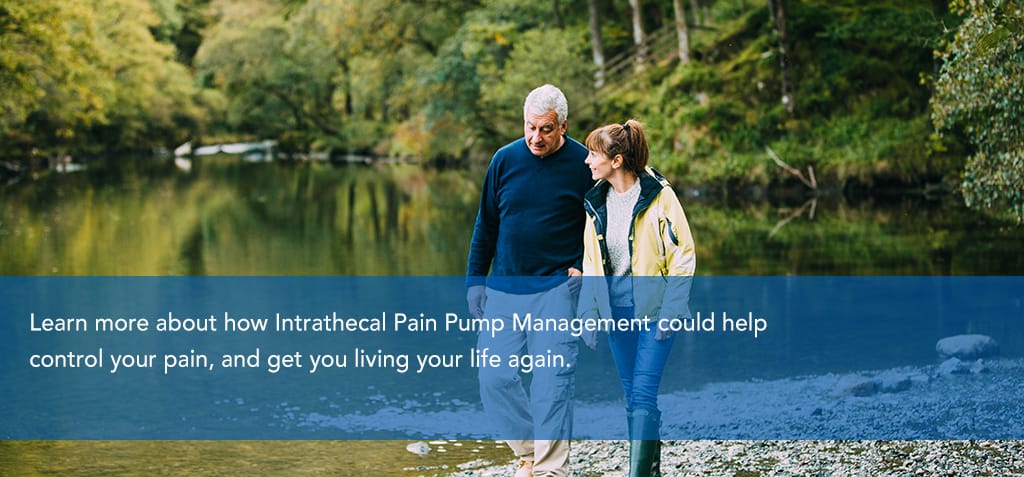 learn more about intrathecal pain pumps. Image of couple walking along lake