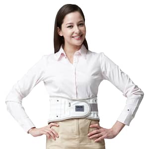 woman wearing back brace model Dr. Michael A. Castillo offers to patients to help relieve back pain